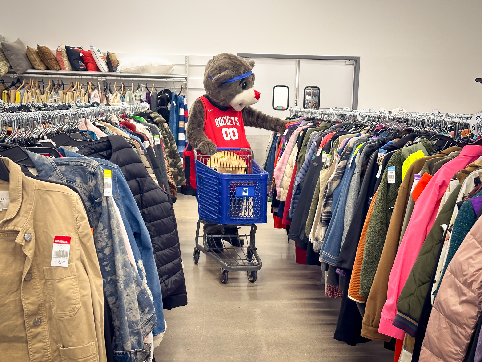 Houston Rocket's mascot Clutch shops at Goodwill Westchase District
