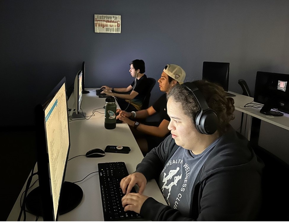 woman with autism coding on computer at nonpareil in westchase district houston